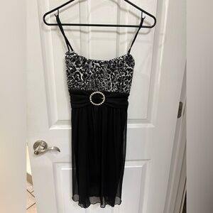 Black Leopard Print Sundress with Rhinestone Waist Accent
Very flowy